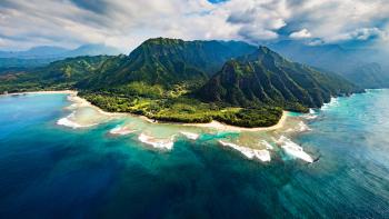 Pacific island with blue water around it